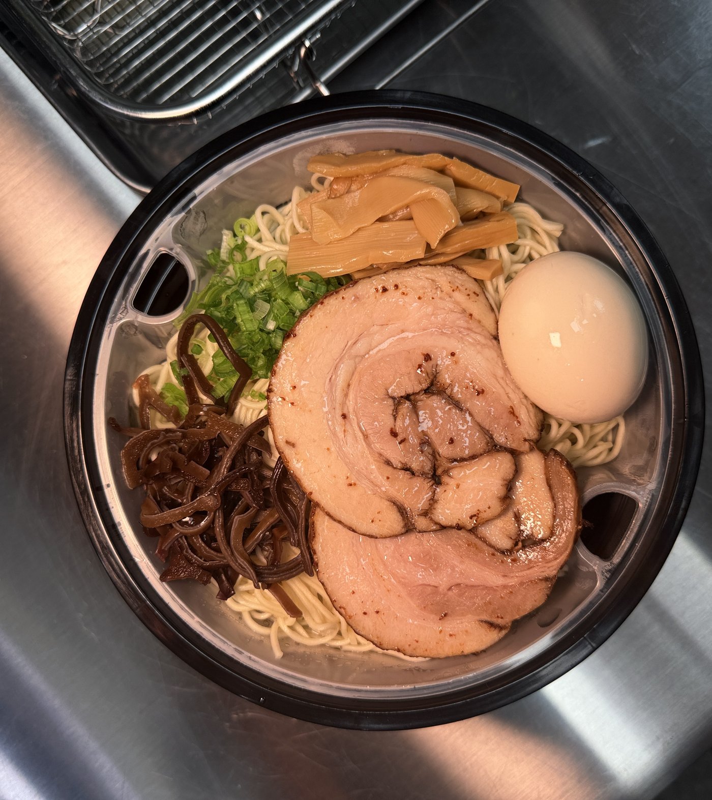 Wakishi ramen bowl with chashu, ajitama, menma and kikurage